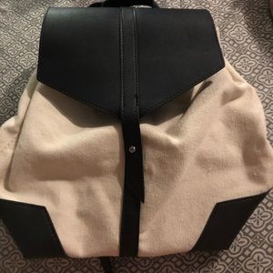 Canvas Vegan leather back pack purse